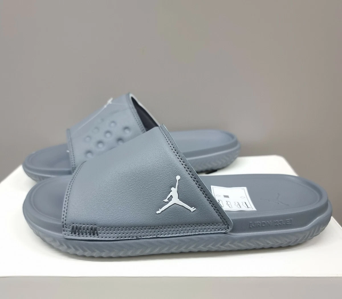 Grey jordan hotsell slides