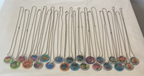 23 TROLLS Multicolored Bottle Cap Shaped Necklaces/Charms Some Duplicates