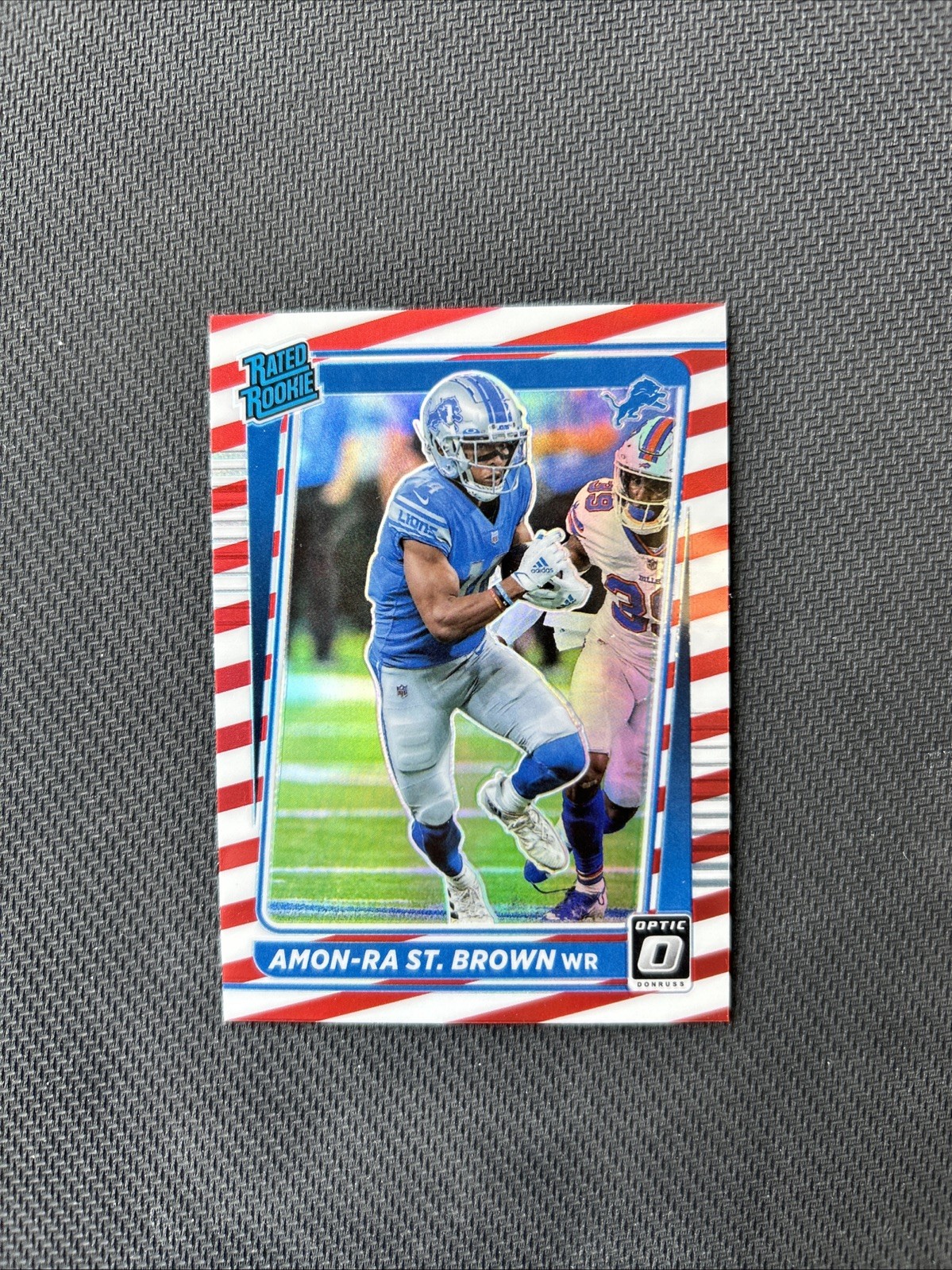 2021 Panini Donruss Optic Rated Rookie Amon-Ra St. Brown #228 Freedom Prizm (RC)