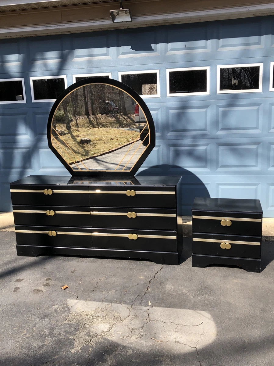 Gold and 2024 black dresser