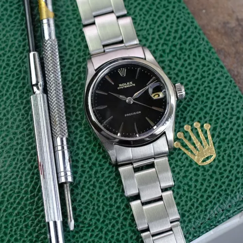Rolex Ladies Oyster Date 6466 Black Dial 31mm Smooth Bezel Oyster Band Watch