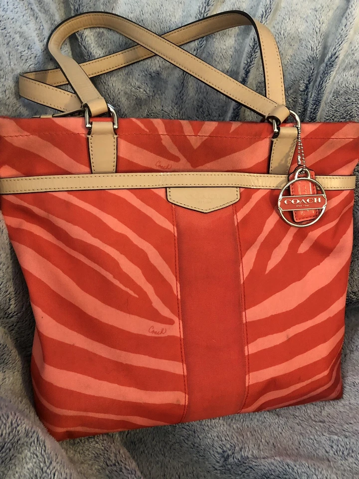 Coach Orange and Pink Zebra No. L1380-F23283 shoulder purse Significant Stains.