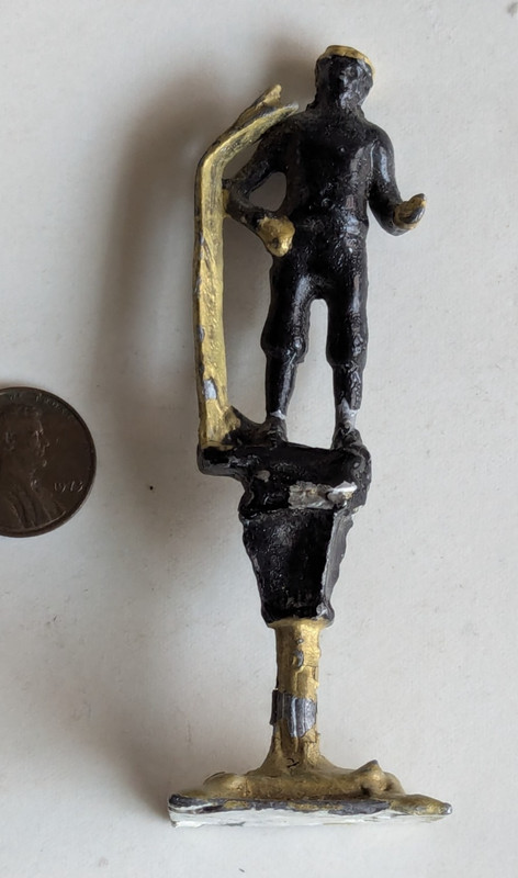 BLACK AMERICANA ANTIQUE LEAD FIGURE OF SKIING 3  3/4'' TALL  TOY.