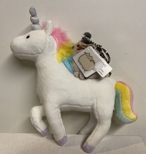 pusheen riding a unicorn