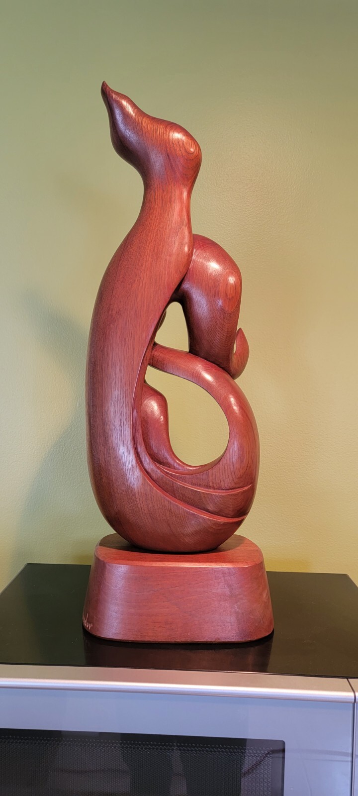 MODERNIST WOOD SCULPTURE BY ECUADORIAN ARTIST LUIS POTOSI. 1999. Signed