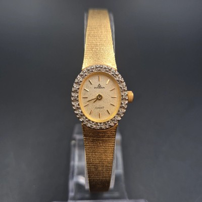 Elegante Dugena Damen Uhr – Goldton mit funkelndem Zierkranz