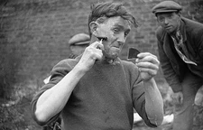 Tramp uses a fragment of a mirror to aid him in his shaving 1936 Old Photo
