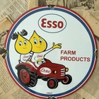 VINTAGE 1957 ESSO FARM PRODUCTS OIL GAS DEALER 12 INCH PORCELAIN ENAMEL SIGN