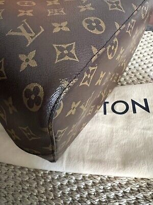 Bucket cloth handbag Louis Vuitton Brown in Cloth - 31704114