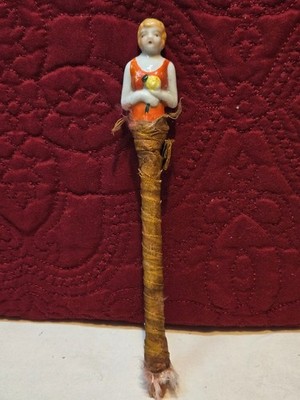 VINTAGE/ANTIQUE PORCELAIN HALF DOLL ON WOODEN HANDLE; MARKED ''FOREIGN''