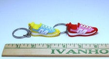 Lot of two sneaker / tennis shoe key chains great collectible set hard to find.