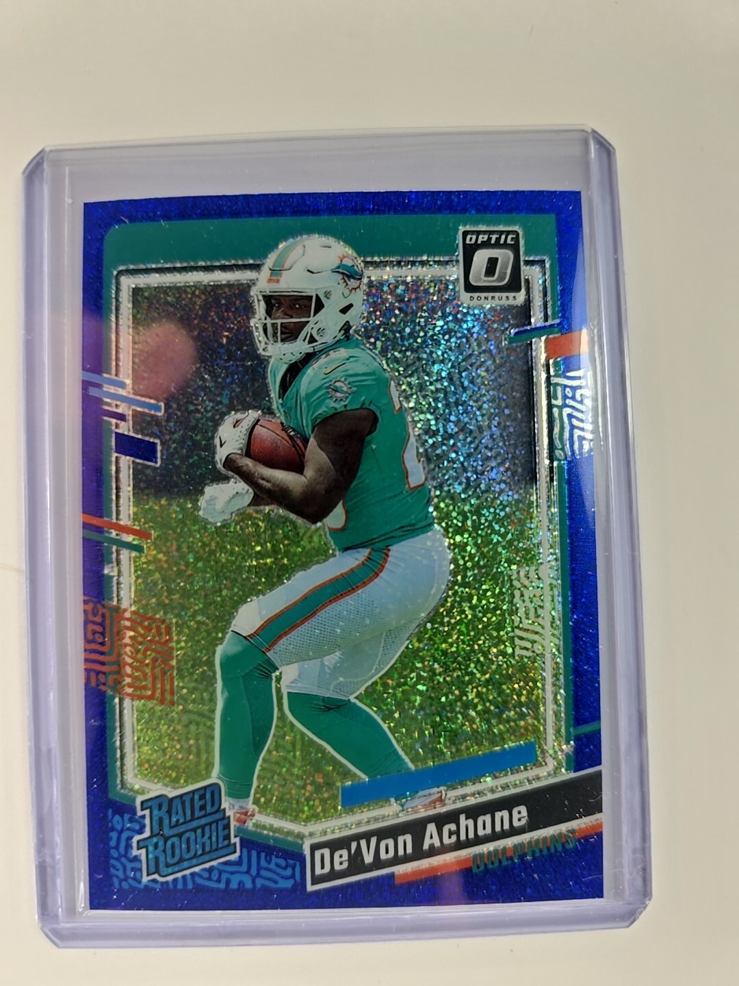 2023 Donruss Optic Devon Achane Rated Rookie Blue Glitter SSP #269 Dolphins!!