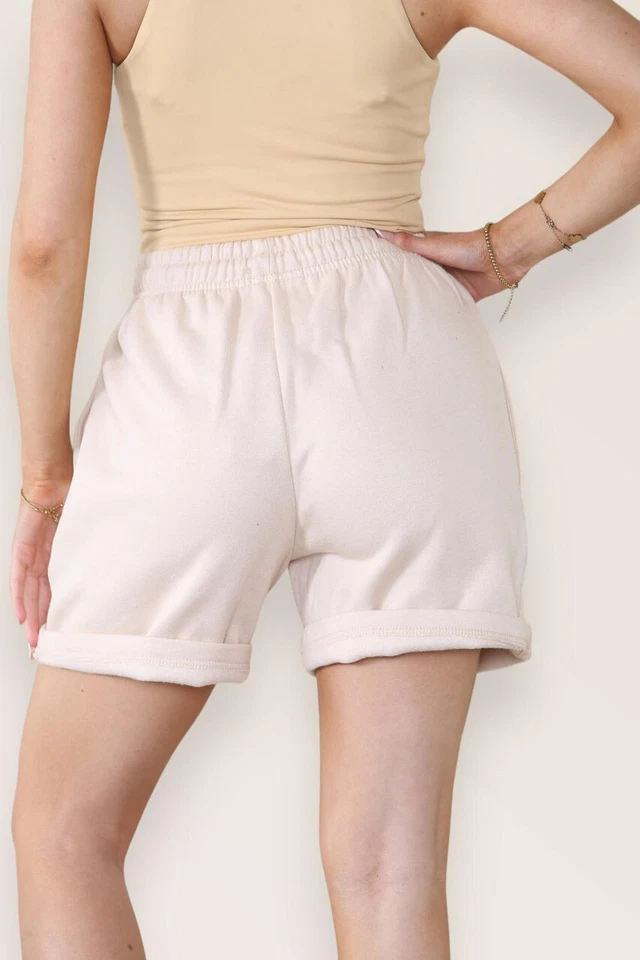 Pantalones cortos de verano de cintura elástica con bolsillos delanteros lisos de lana para mujer y dama Foto 4 de 4