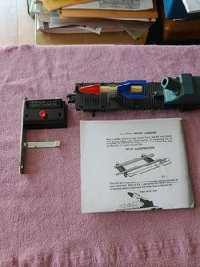 25046 American Flyer S Gauge Rocket Launcher w/ rocket, button, etc.
