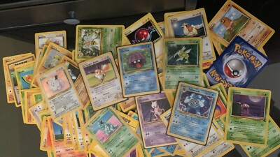 50 pokemon base set cards. 2 Holo guaranteed and 1 first edition 