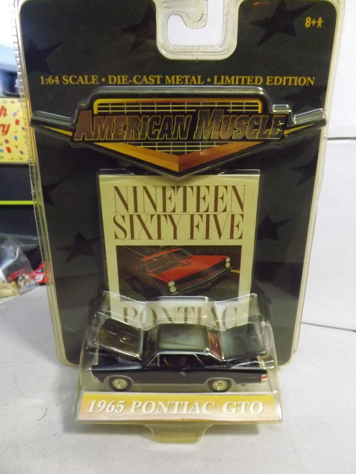Ertl American Muscle Black 1965 Pontiac GTO 1/64 Scale