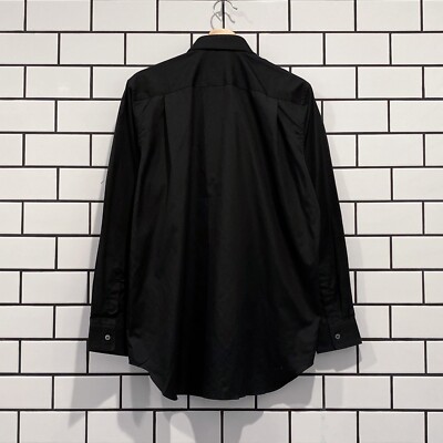 COMME DES GARCONS CDG PLAY RED EMBLEM BUTTON DOWN LS SHIRT COMME DES GARCONS CDG PLAY RED EMBLEM BUTTON DOWN LS SHIRT