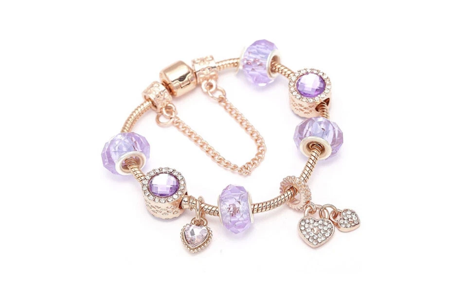Pulsera con dije de corazón de cristal rosa enchapado en oro rosa de 18 quilates hecha con Swarovski Foto 2 de 3