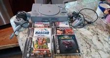 Sony PS1 Two original controllers.6 videogames, Includes memory card Tested