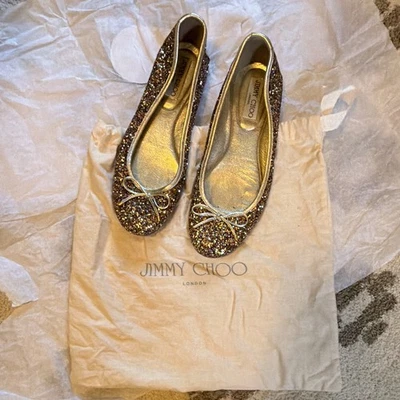 Jimmy Choo Mujer EE. UU. 8 Cuero Brillo Lazo Sin Cordones Ballet Planos Dorado - Imagen 1 de 4