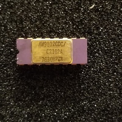 AM9102CDC Gold Ceramic, 1024 × 1-Bit SRAM, AMD's first RAM chip = C2102A Intel