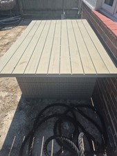 Large grey rattan garden table