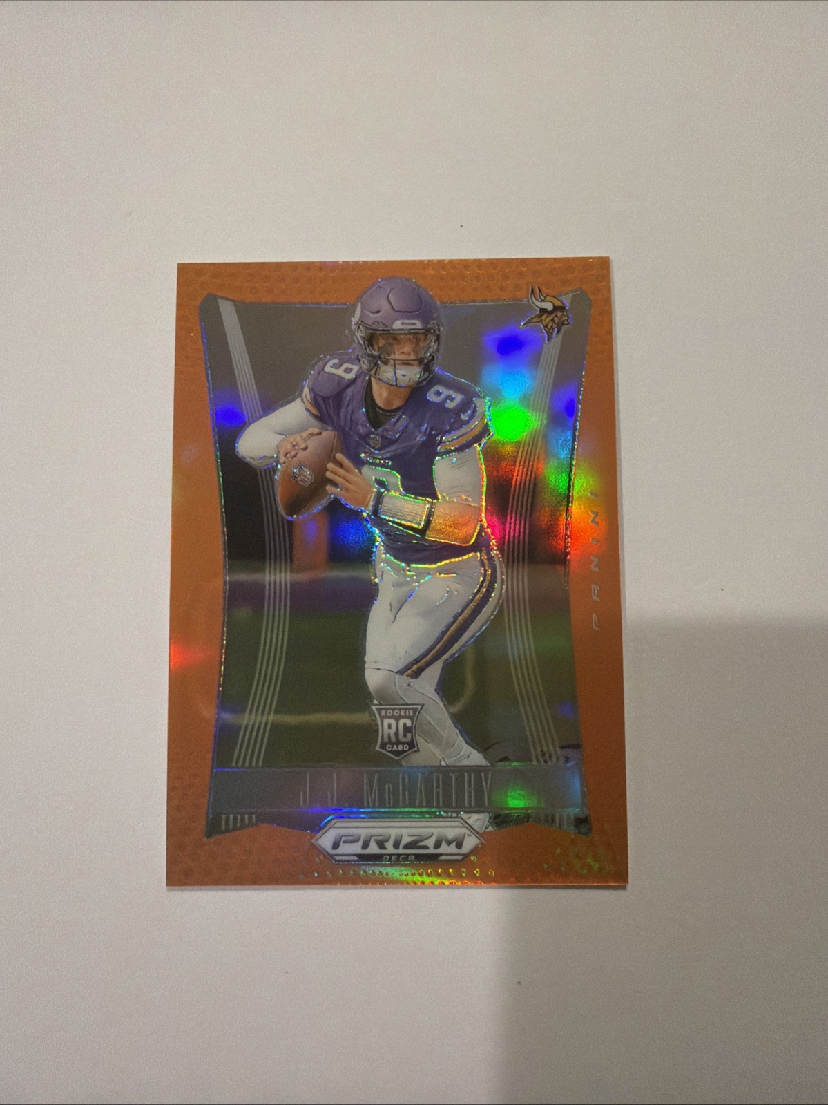 2024 Panini Prizm Deca - J.J. McCarthy #203 Orange Prizm /49 (RC)