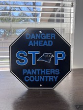 Carolina Panthers Nfl Vintage Stop Sign Featuring The Classic Panthers Logo