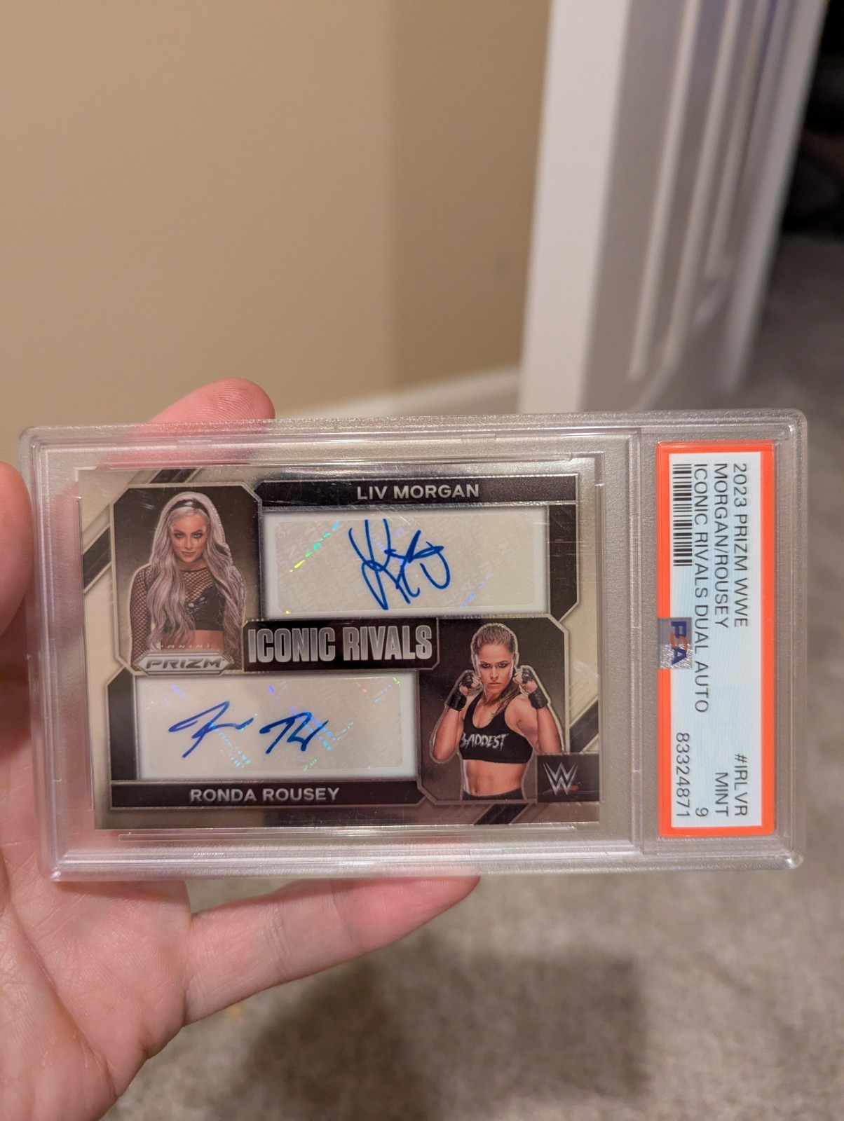 Liv Morgan / Ronda Rousey #1 Wrestling Cards 2023 Panini Prizm WWE Iconic Rivals Dual Autographs trading card — raw and PSA graded price guide