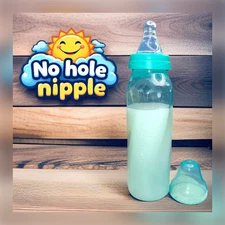 Sealed 8 ounce baby bottle with no hole nipple. Evenflo Teal. Breast milk white