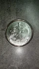 2012-Silver American Eagle 1 Ounce-In Mint Capsule Uncirculated Lite Toning