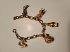 Vintage Avon Charm Bracelet 5 Charms 7.25 Inches — photo 1