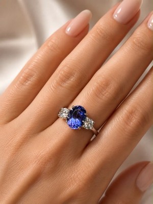 Vintage Oval Tanzanite And Natural Old European Cut Diamond Platinum ring