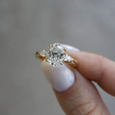 2 Ct Oval Cut VVS1 Moissanite Three Stone Engagement Ring 14K Yellow Gold Plated
