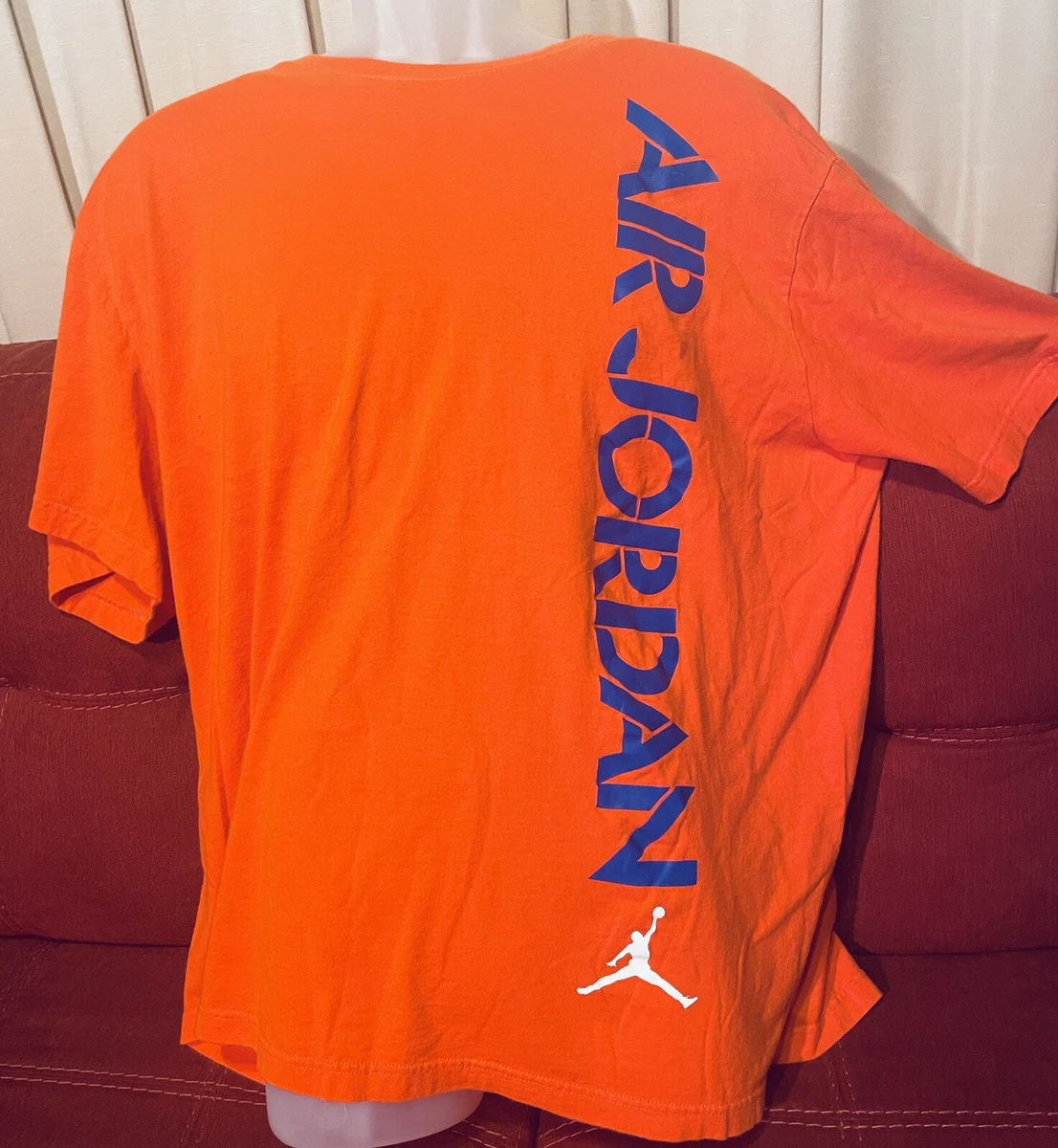 Orange and blue jordan shirt hotsell