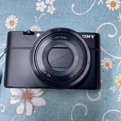 Sony RX100 Compact Digital Camera 20.2 MP 3.6x Optical Zoom Date