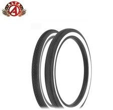 SCHWINN STYLE WHITEWALL BRICK 20 X 1.75 S2 W/ 20 X 2.125 S2 STINGRAY SLICK TIRE.