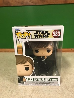 Luke Skywalker & Grogu #583 from Star Wars () – Pokémon card