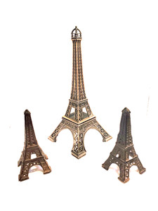 Three vintage metal replicas of the Eiffel Tower (two 6.5" and one 13.5" tall)