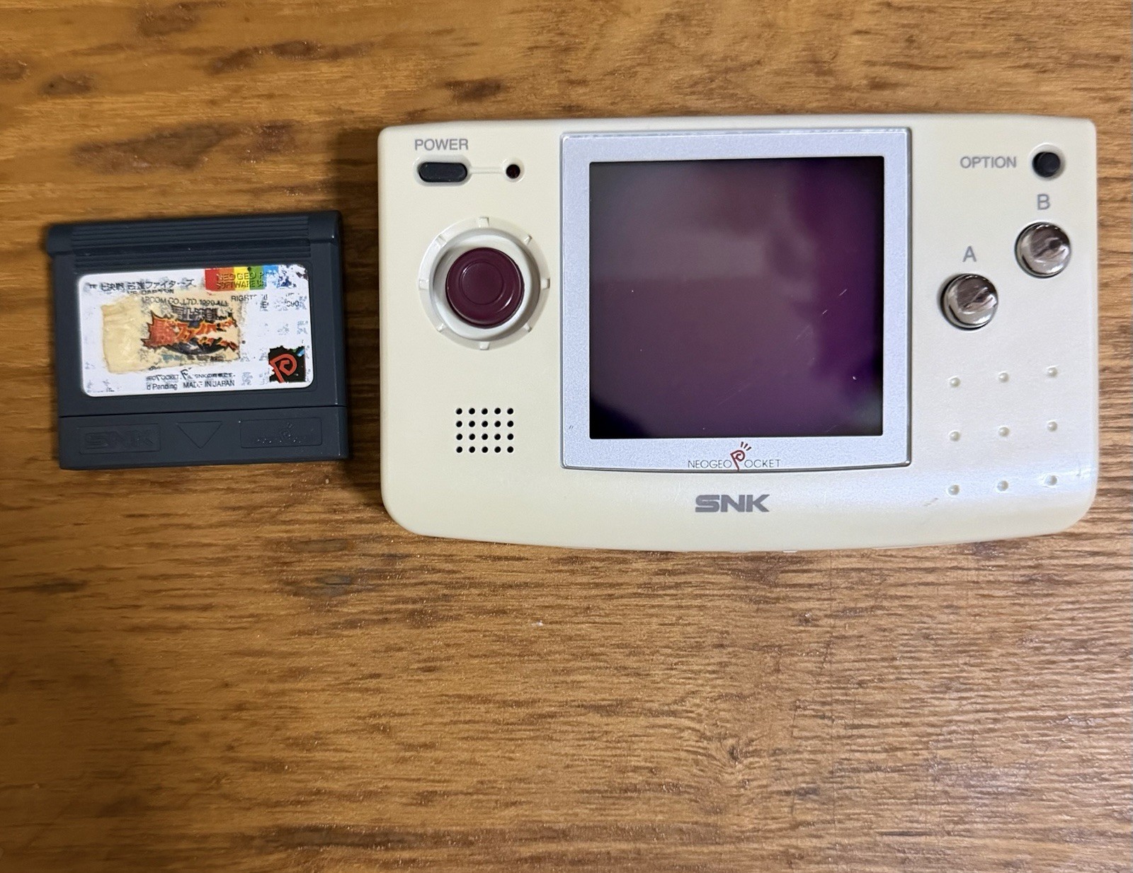 Neo Geo Pocket White with Snk vs Capcom game