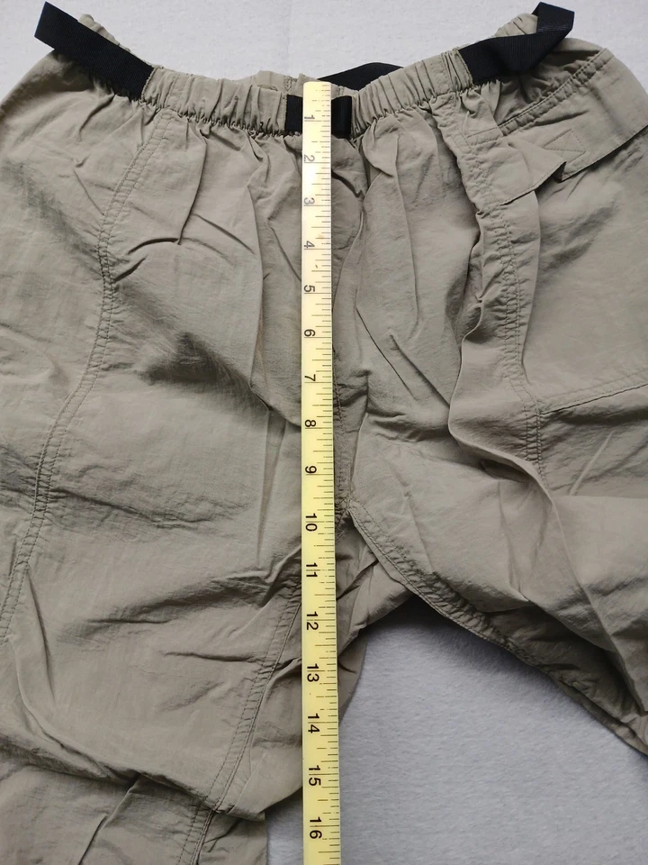 Pantalones pequeños regulares de nailon beige resistentes a la lluvia Cabelas de caza Foto 2 de 4