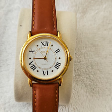 GUESS Women's Vintage Quartz Wristwatch Gold Case Roman Dial Brown Leather 25mm