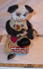 SMOKING AND SHOE SHINING PANDA BEAR TIN BATTERY TOY WORKS ALPS JAPAN