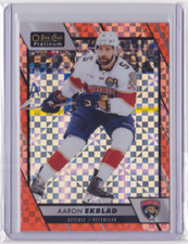 23-24 O-PEE-CHEE PLATINUM ORANGE CHECKERS PARALLEL /25 AARON EKBLAD #98 PANTHERS