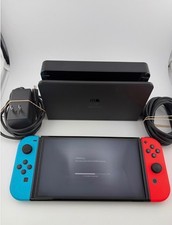 Nintendo Switch – OLED Model w/ Neon Red & Neon Blue Joy-Con