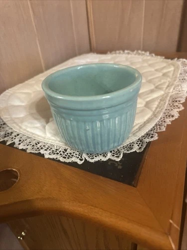 vintage USA-marked stoneware ribbed crock bowl in turquoise or seafoam green.
