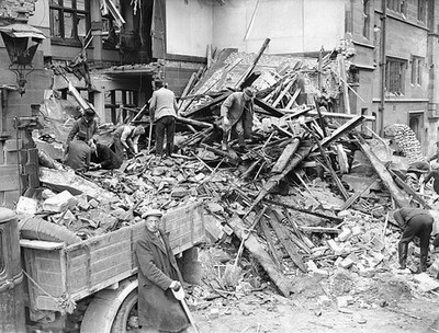 Rescue workers seen here searching through the wreckage of the Pol- Old Photo 1