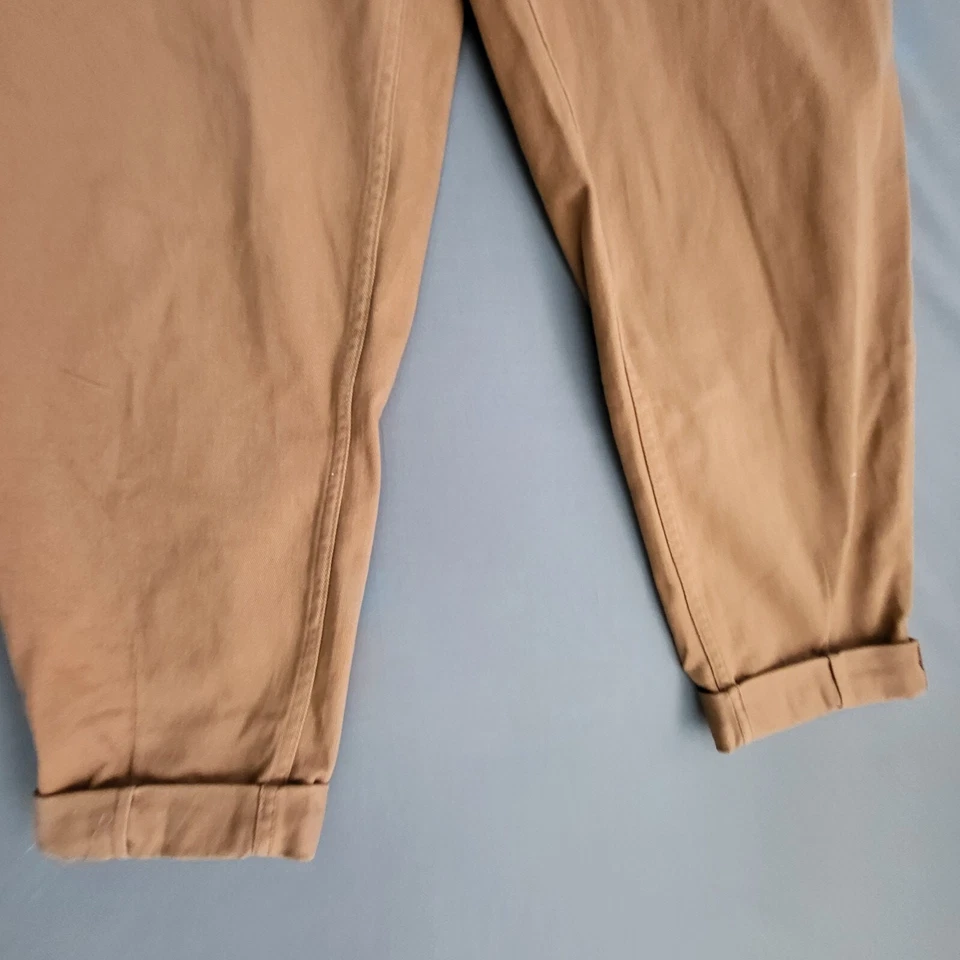 Pantalones de mezclilla H&M divididos para mujer talla 8 tiro alto con puños cónicos recortados marrón * Foto 3 de 4