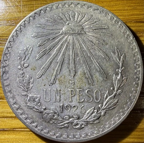 1926 Mexico Un Peso Silver — photo from the most recent tracked eBay sale