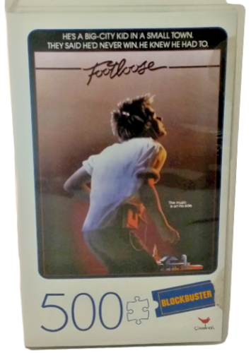 Footloose 500pc. Jigsaw Puzzle in Blockbuster VHS Look Video Case - Afbeelding 1 van 7